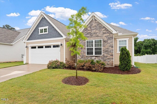 craftsman house featuring driveway, stone siding, and a garage