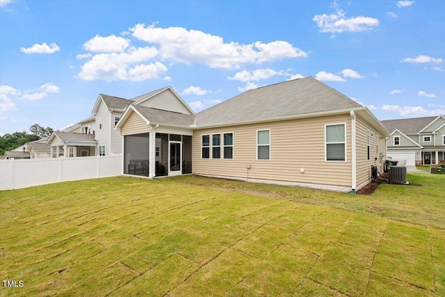 back of property featuring a sunroom