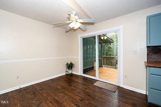 interior space featuring a textured ceiling, dark hardwood / wood-style floors, and ceiling fan