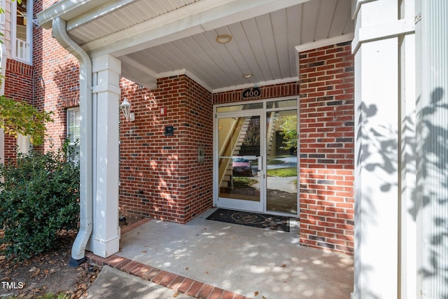 doorway to property with covered porch