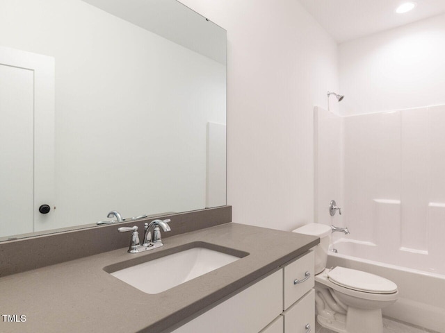 full bathroom with toilet, vanity, and  shower combination