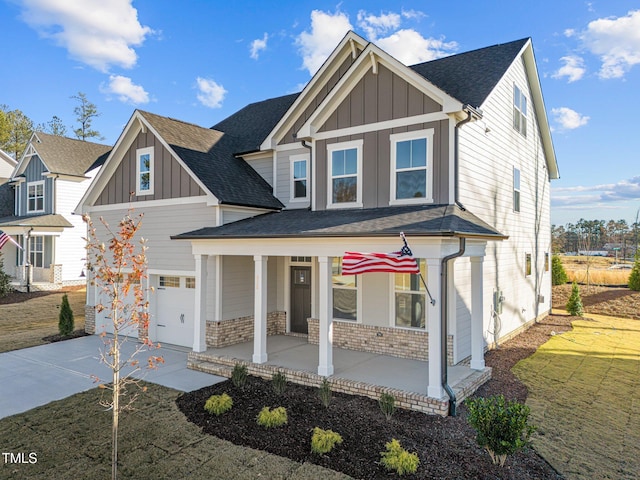 craftsman-style home featuring a porch and a garage