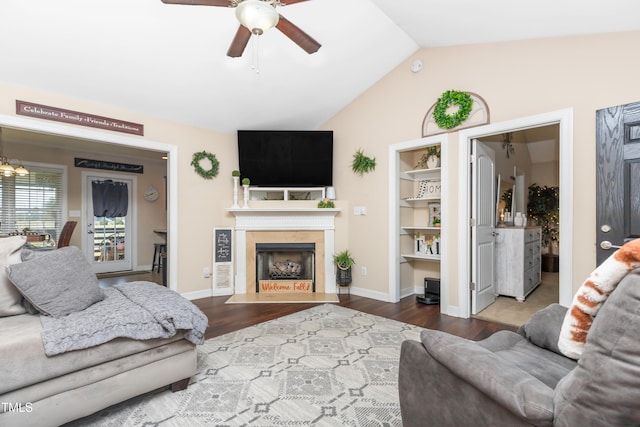 living room with hardwood / wood-style floors, lofted ceiling, and ceiling fan