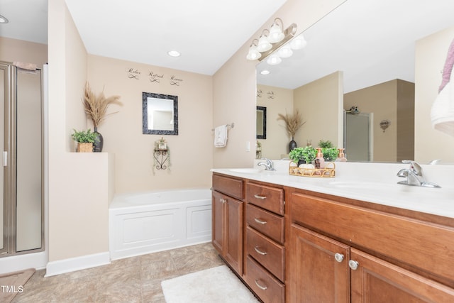 bathroom with vanity, tile patterned floors, and plus walk in shower