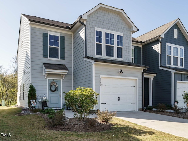 view of front of property with a garage