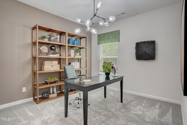 office space featuring light carpet and a chandelier