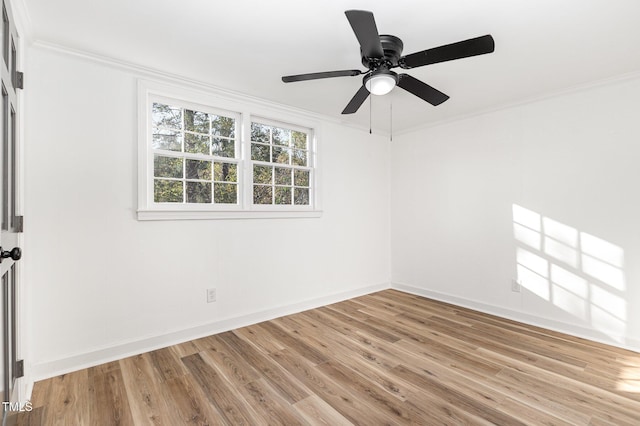 unfurnished room featuring ceiling fan, crown molding, and light hardwood / wood-style flooring