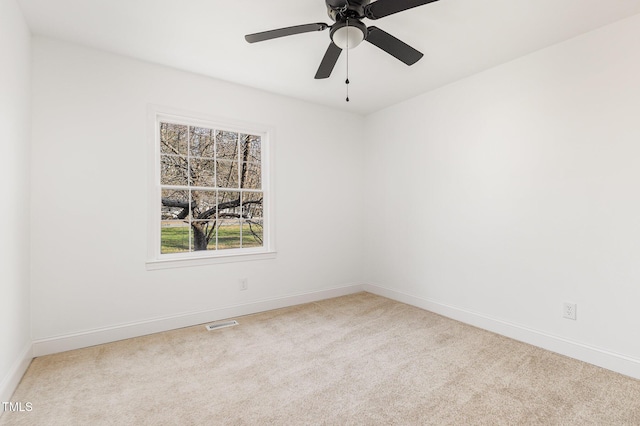 empty room with light carpet and ceiling fan