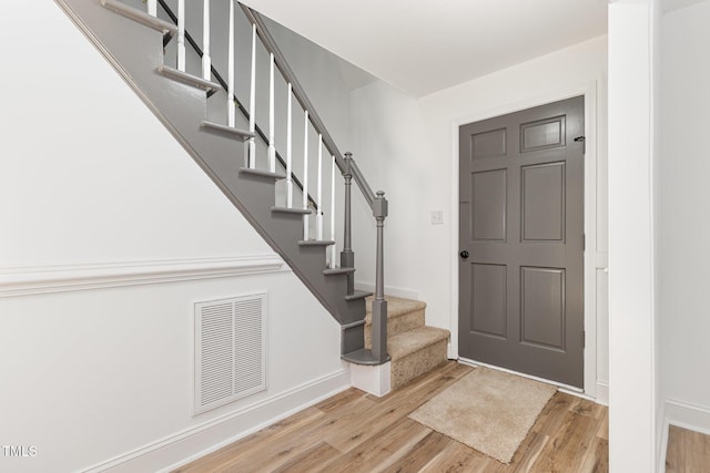 foyer entrance featuring light hardwood / wood-style floors