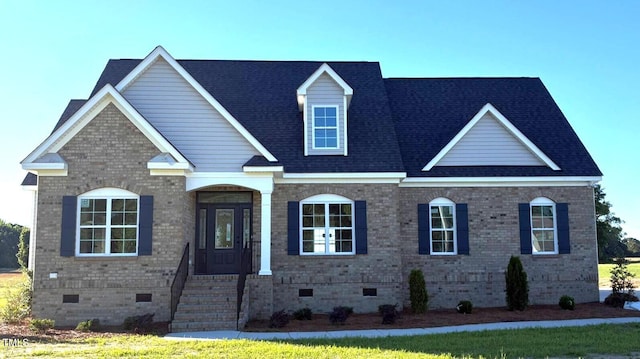 1665 S Old Carriage Rd, Rocky Mount, NC 27804 - view of front of house featuring crawl space, brick siding, and roof with shingles