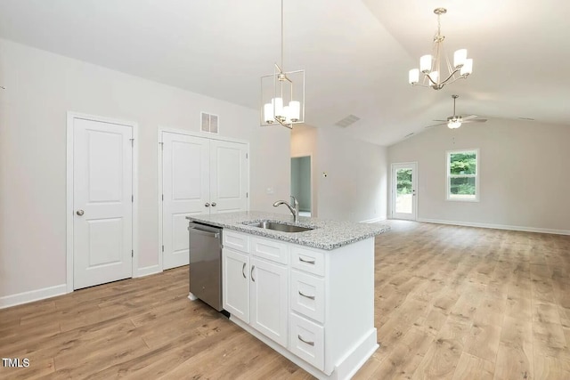 kitchen with pendant lighting, white cabinets, ceiling fan with notable chandelier, sink, and stainless steel dishwasher