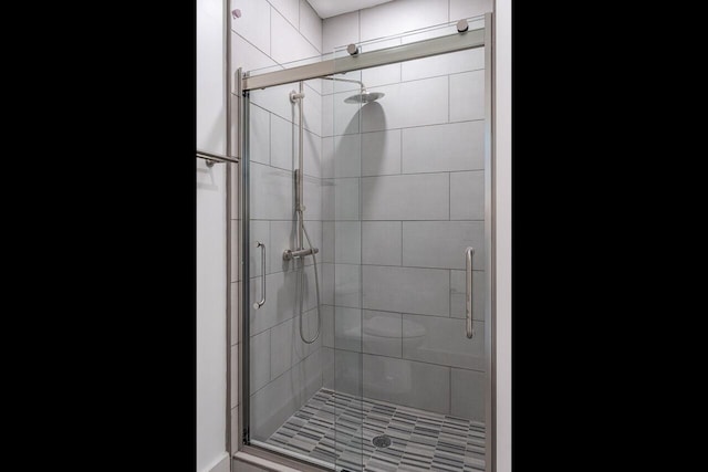 bathroom with an enclosed shower