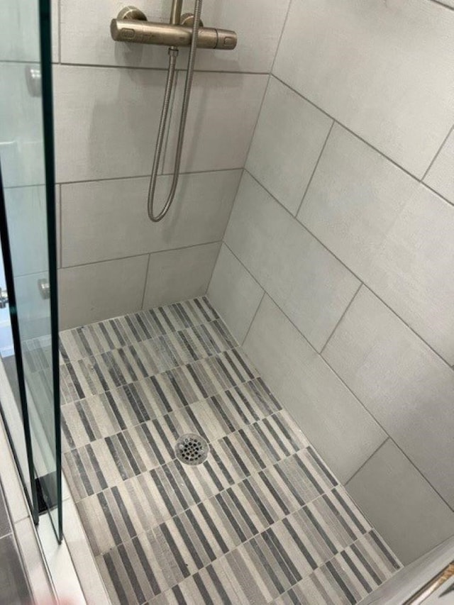 bathroom featuring walk in shower