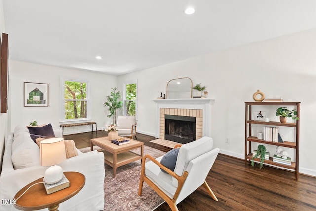 120 Kingston Dr, Chapel Hill, NC 27514 - living room with wood finished floors, a brick fireplace, recessed lighting, and baseboards