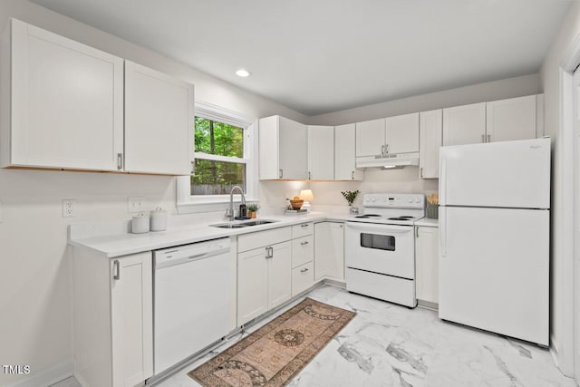 120 Kingston Dr, Chapel Hill, NC 27514 - kitchen with white appliances, under cabinet range hood, light marble finish flooring, a sink, and light countertops