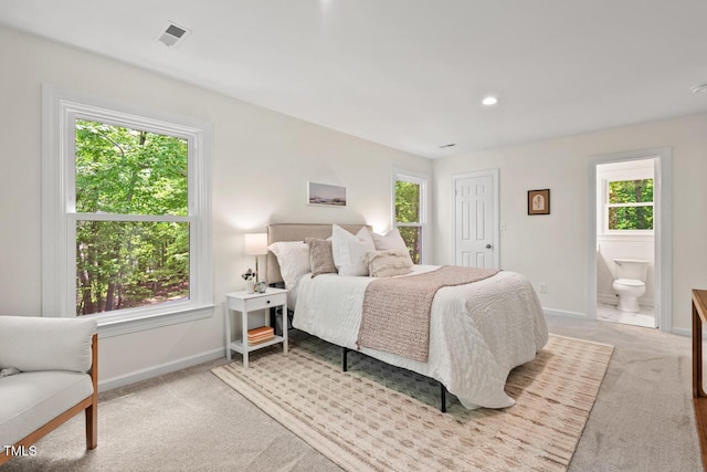 120 Kingston Dr, Chapel Hill, NC 27514 - carpeted bedroom featuring baseboards and connected bathroom