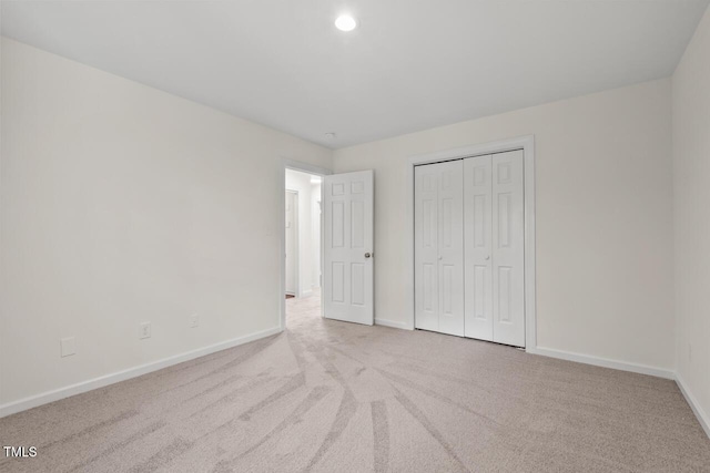 120 Kingston Dr, Chapel Hill, NC 27514 - unfurnished bedroom with baseboards, carpet floors, a closet, and recessed lighting