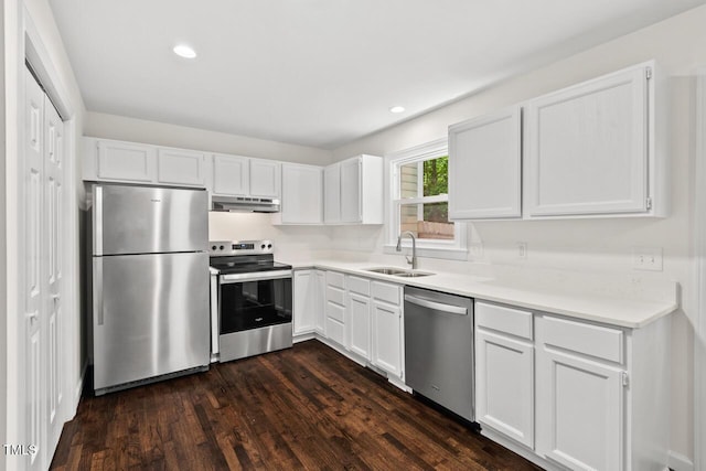 120 Kingston Dr, Chapel Hill, NC 27514 - kitchen featuring appliances with stainless steel finishes, a sink, under cabinet range hood, white cabinetry, and recessed lighting