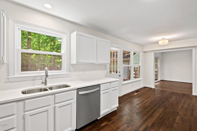120 Kingston Dr, Chapel Hill, NC 27514 - kitchen with stainless steel dishwasher, a sink, light countertops, dark wood-style flooring, and white cabinetry