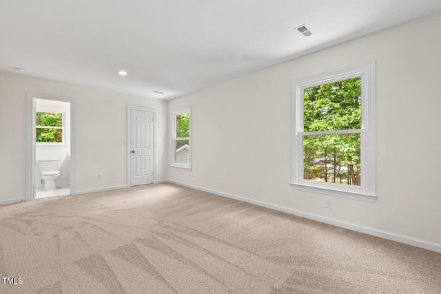 120 Kingston Dr, Chapel Hill, NC 27514 - spare room with healthy amount of natural light, carpet floors, and baseboards
