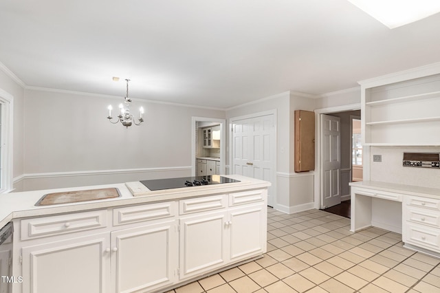 kitchen with hanging light fixtures, white cabinetry, ornamental molding, and black electric stovetop