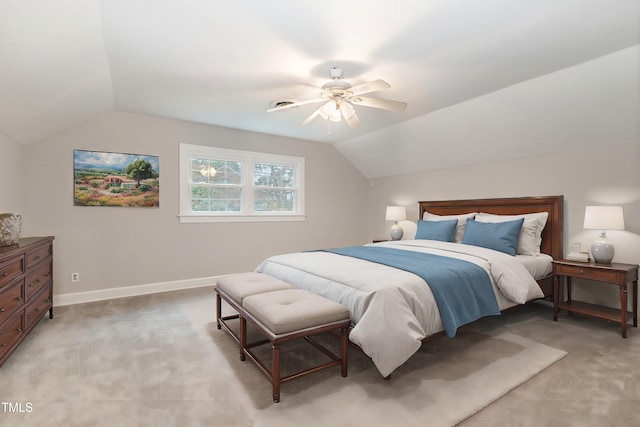 carpeted bedroom featuring ceiling fan and lofted ceiling