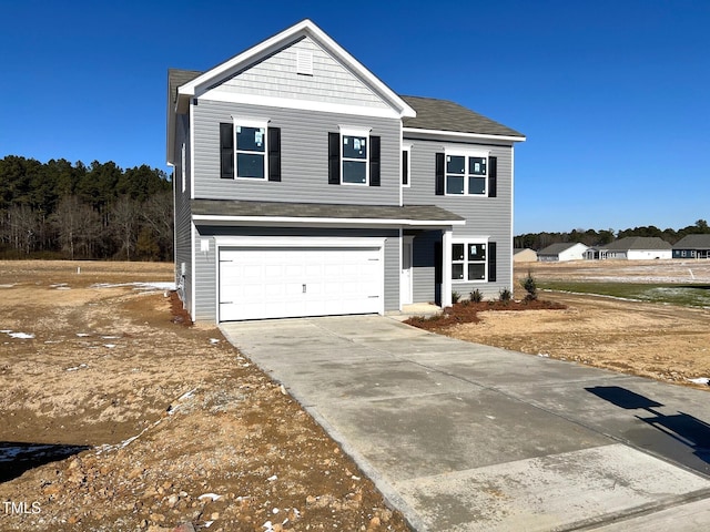 front of property featuring a garage