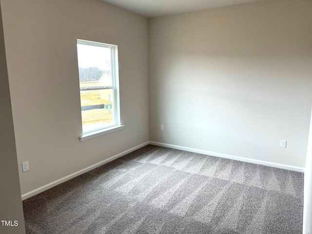 view of carpeted spare room