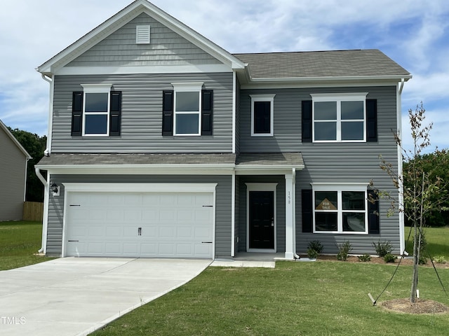 158 Citizens Ct Unit 32, Four Oaks, NC 27524 - view of front facade featuring a front yard, a garage, and concrete driveway