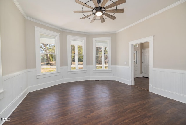 unfurnished room featuring crown molding, ceiling fan, and dark hardwood / wood-style flooring