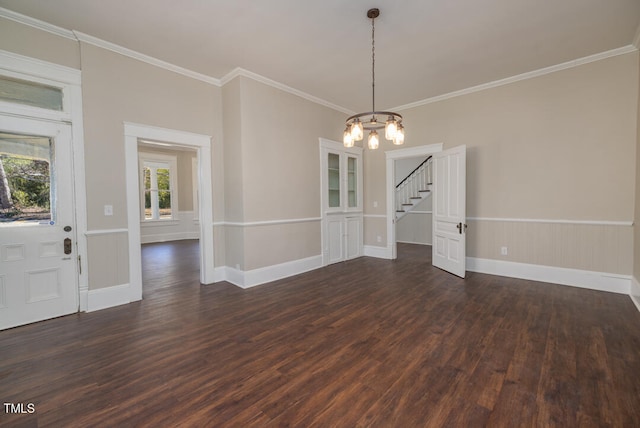 unfurnished dining area featuring crown molding, a chandelier, and dark hardwood / wood-style floors