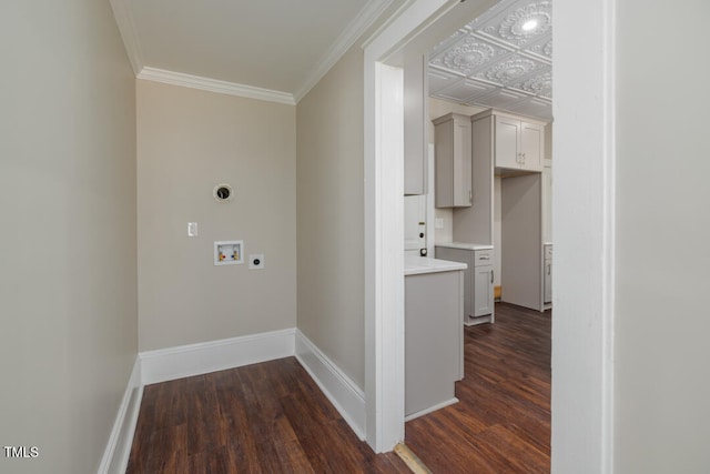 clothes washing area with hookup for a washing machine, crown molding, hookup for an electric dryer, and dark hardwood / wood-style floors