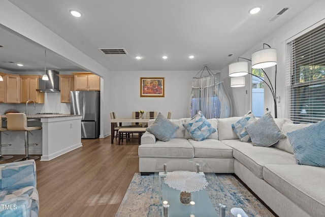 living room featuring dark hardwood / wood-style floors