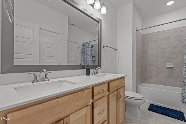 full bathroom featuring toilet, shower / tub combo, vanity, and tile patterned flooring