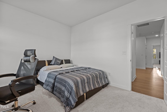 bedroom featuring light hardwood / wood-style flooring