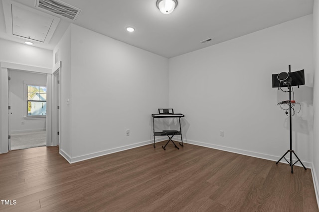 empty room with dark wood-type flooring