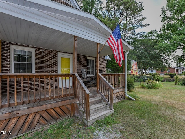 178 Paceville Rd, Selma, NC 27576 - wooden terrace with a lawn