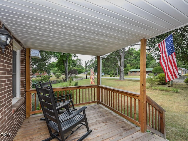 178 Paceville Rd, Selma, NC 27576 - wooden terrace with a lawn