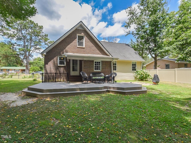 178 Paceville Rd, Selma, NC 27576 - back of house featuring brick siding and a wooden deck