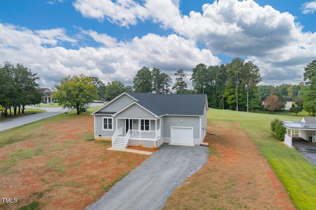 ranch-style house with a front yard, covered porch, and a garage