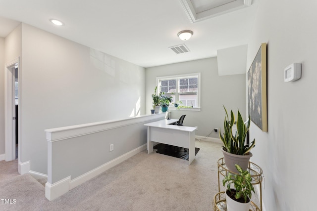 home office featuring ornamental molding and light colored carpet