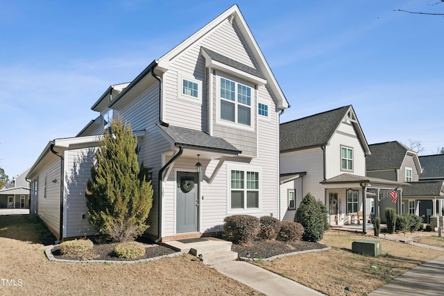 view of front property featuring covered porch