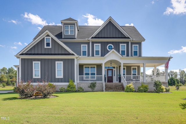 view of front of house featuring a porch and a front lawn