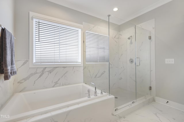 bathroom with crown molding and shower with separate bathtub