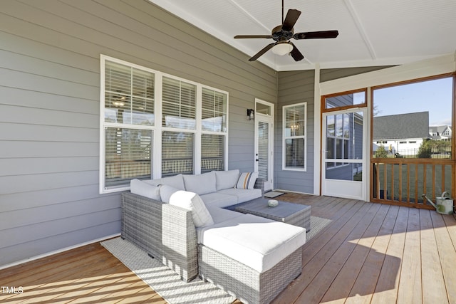 wooden terrace featuring outdoor lounge area and ceiling fan