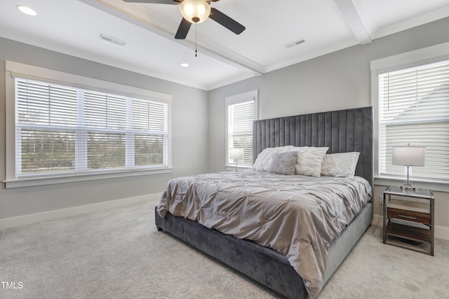 bedroom with beamed ceiling, ceiling fan, light colored carpet, and crown molding