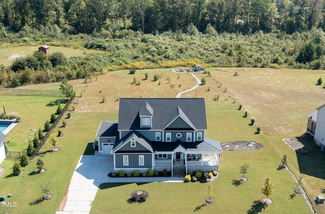 birds eye view of property featuring a rural view