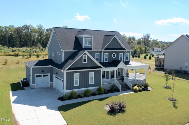 view of front of property with covered porch and a front yard