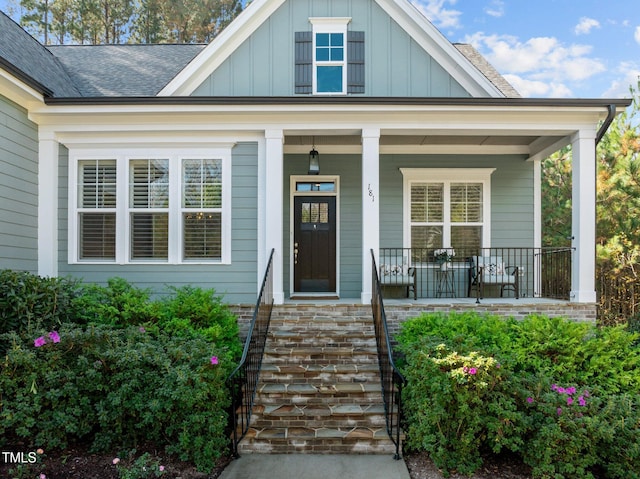 property entrance featuring covered porch