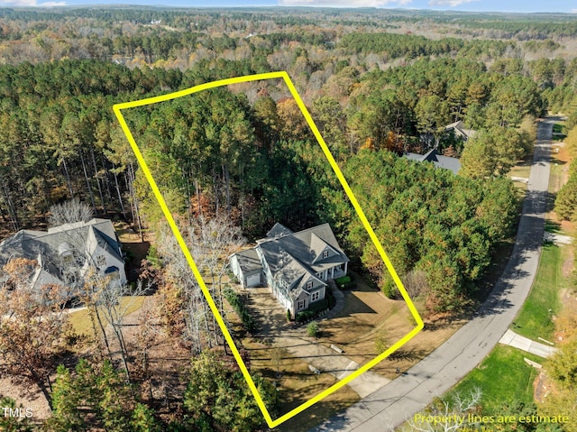181 Colonial Ridge Dr, Pittsboro, NC 27312 - aerial view of property's location featuring a forest and property parcel outlined